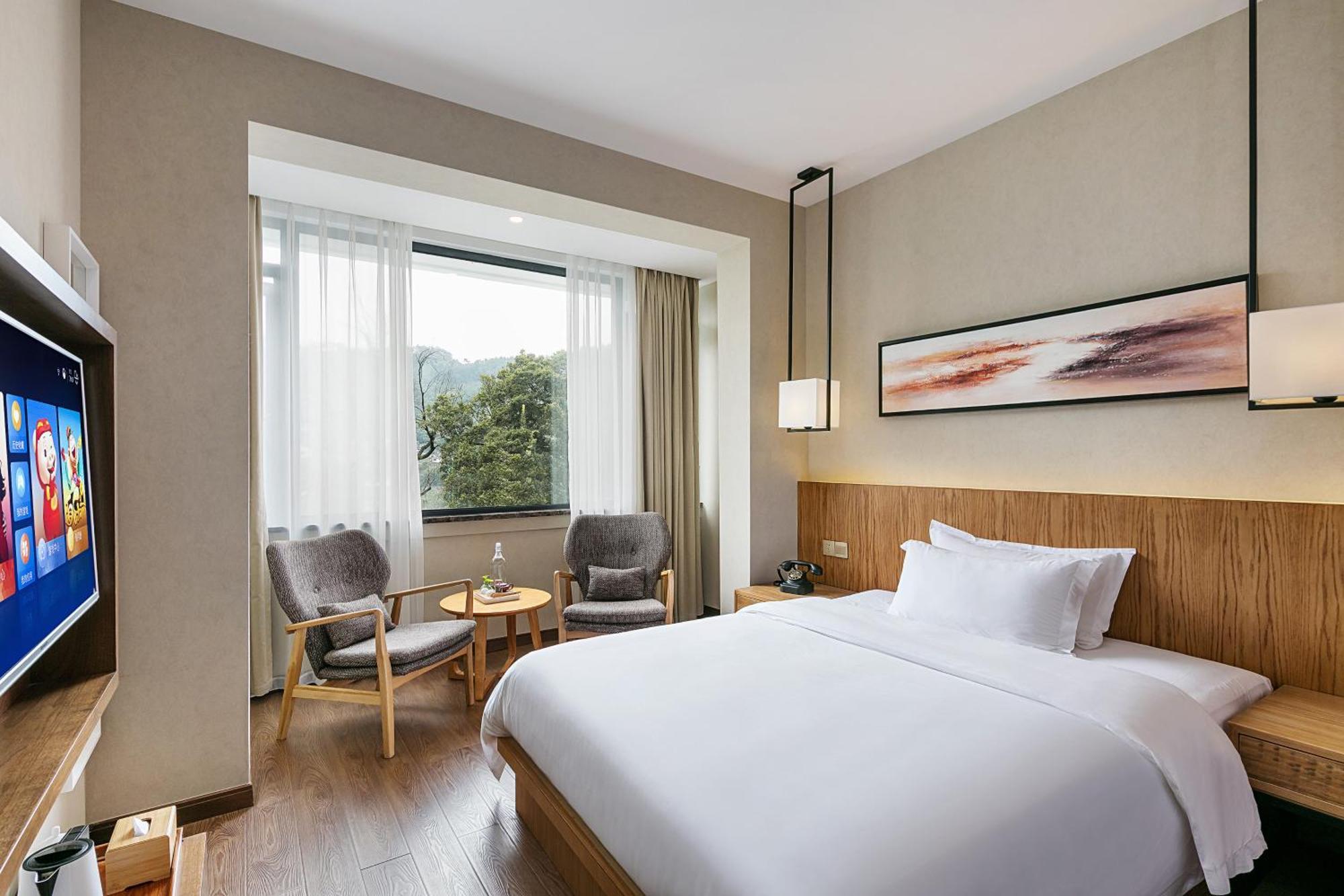 Hangzhou Puyu Travelling With Hotel ภายนอก รูปภาพ